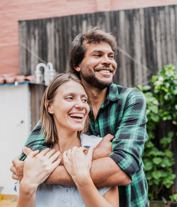 couple hugging and smiling